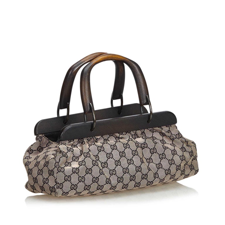 Discover The Gucci Re-Motion White GG Canvas Handbag - 832461AAEW39045 Discover The Gucci Re-Motion White GG Canvas Handbag - 832461AAEW39045
