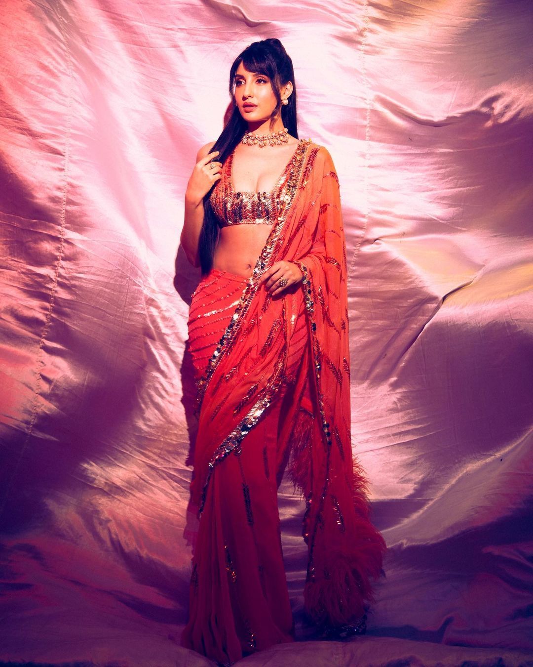 Ethnic Glam: Nora Fatehi's Best Floral Saree Moments Ethnic Glam: Nora Fatehi's Best Floral Saree Moments