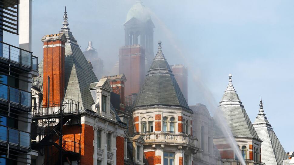Large Fire Engulfs East London Shop; Over 100 Firefighters On Scene Large Fire Engulfs East London Shop; Over 100 Firefighters On Scene